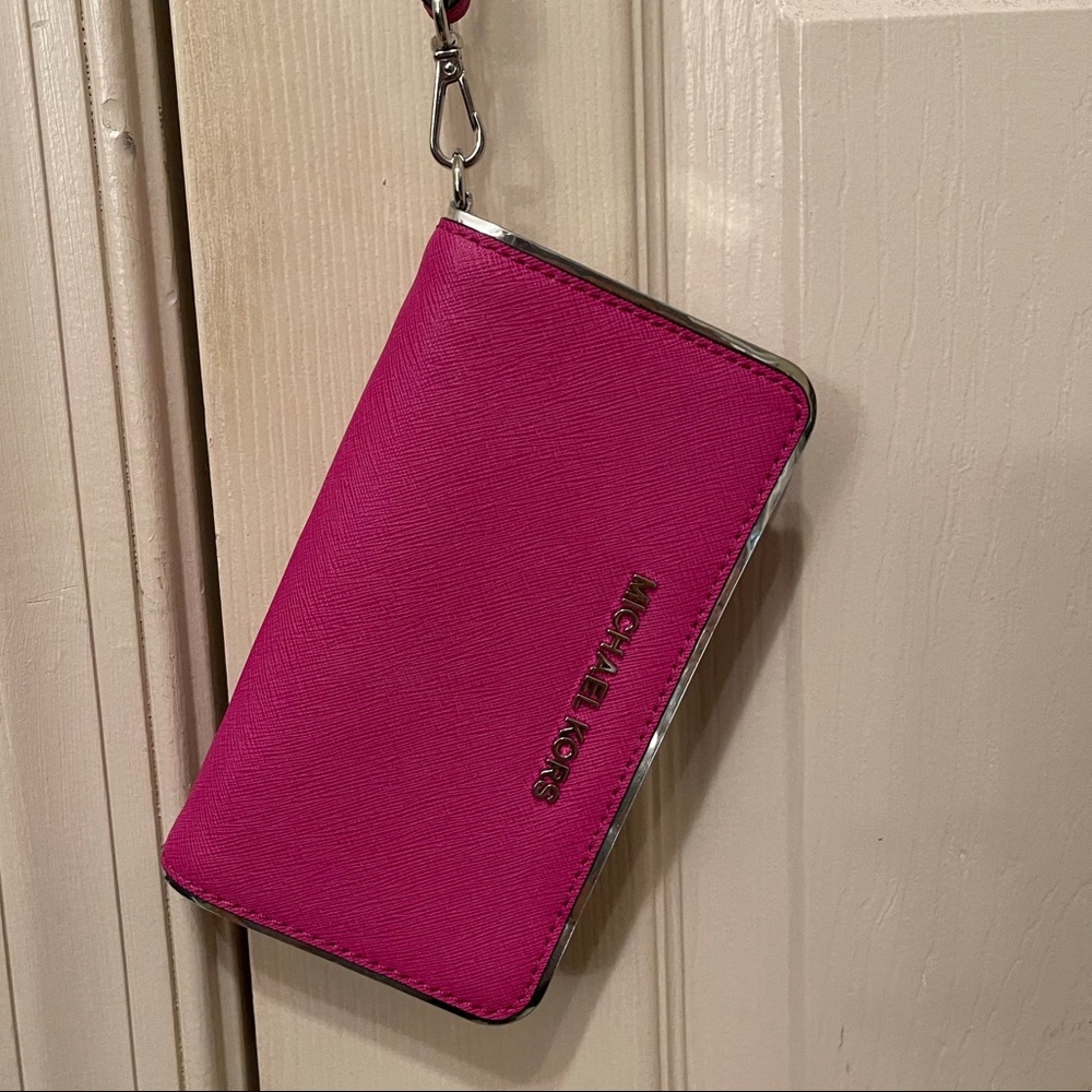 Bright pink Michael kors wristlet